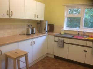 The kitchen at Hever Village Hall, showing the cooker and worktop